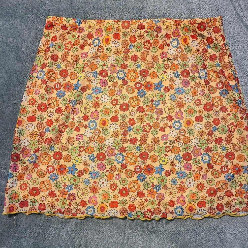 SHEIN multicolored floral mini skirt with orange, red, blue, and green flowers